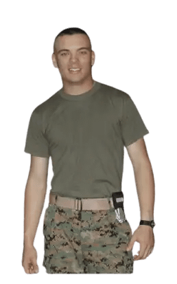 A man in a green t-shirt and camouflage pants.